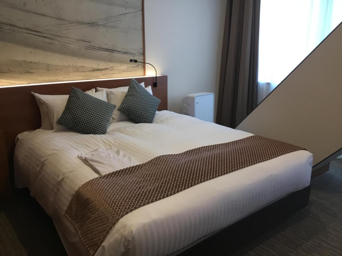 Odysis Suites Osaka Airport Hotel Изуми-Сано Екстериор снимка